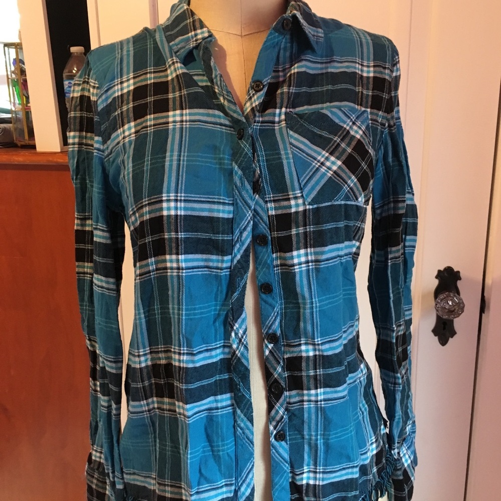 Two plaid shirts, different colors